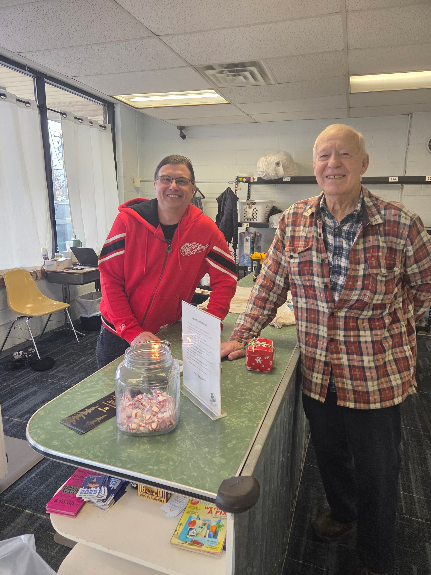 Steve and Russ at the laundromat counter